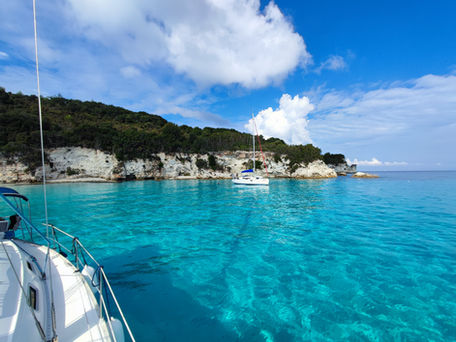 Private yacht anchored in the emerald waters of Antipaxos, Greece
