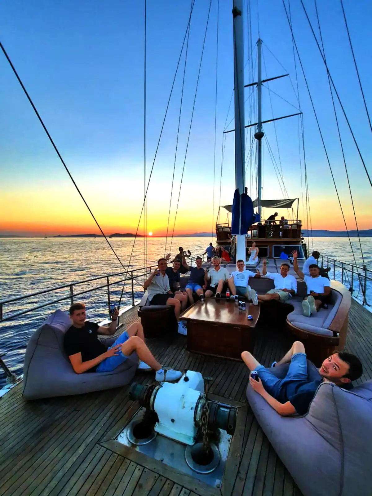 Group of people having drinks on the evening cruise