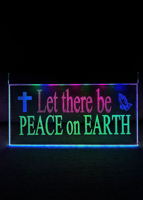 Illuminated "Let there be PEACE on EARTH" sign