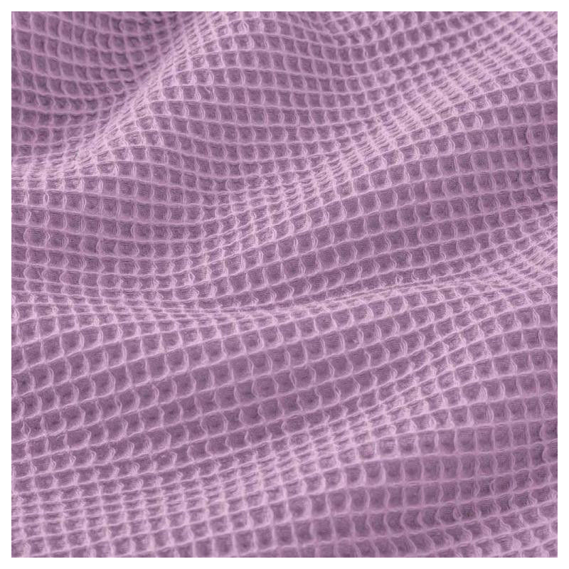 Miniature : Détail du tissage nid d’abeille d’un torchon en coton absorbant.