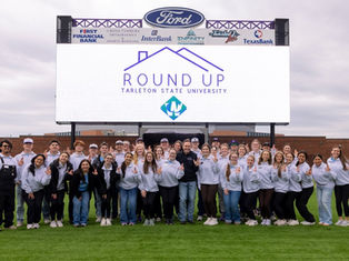 Texans Shrug Off Rain To Serve Community During Tarleton Round Up