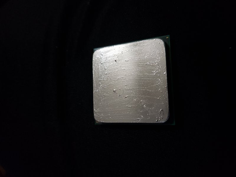 Coollaboratories Liquid Pro Thermal Compound spread across CPU