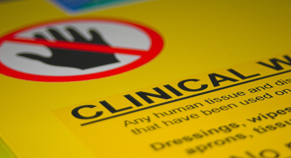 Clinical waste sign signalling dangerous contents