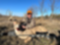 Hunter with harvested pronghorn antelope in South Dakota