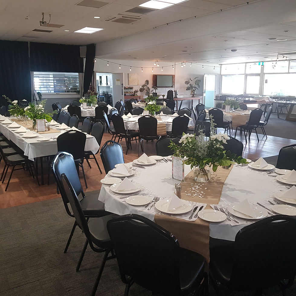 High angle view of a bowling green with neatly arranged seating for an outdoor corporate event