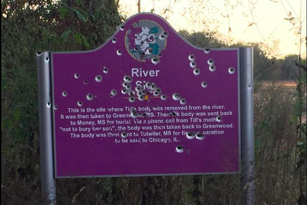 Emmett Till Memorial with bullet holes stands near where Emmett Till's badly abused body was drawn from the river.