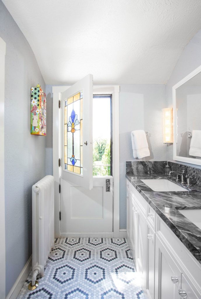 Bathroom with Dutch door and stained glass
