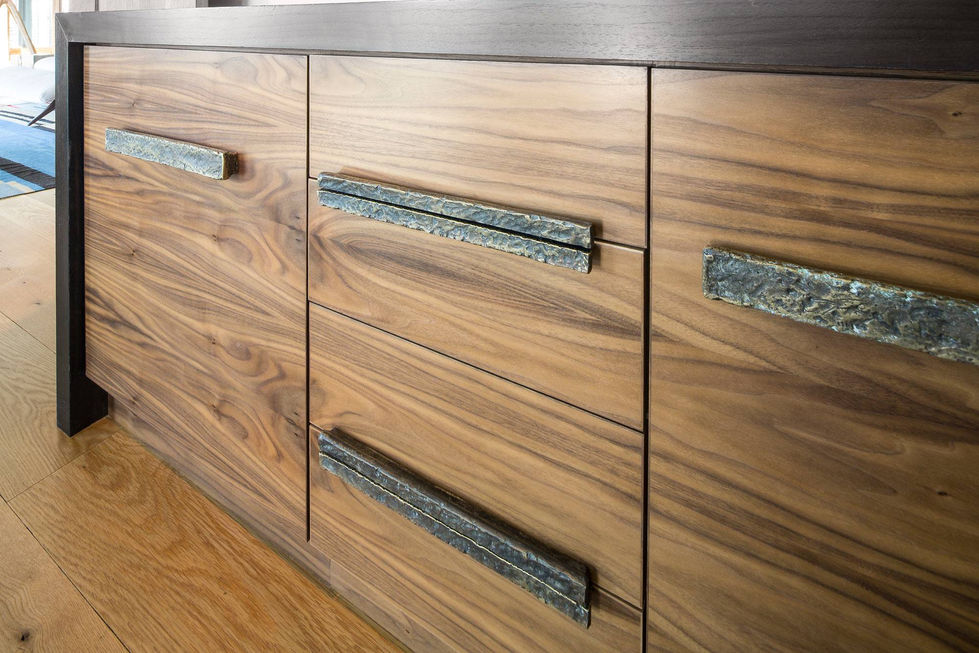 Walnut drawers with textured metal pulls