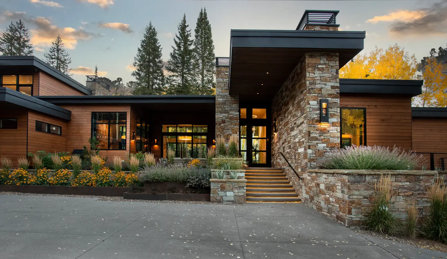Modern stone house, evening view