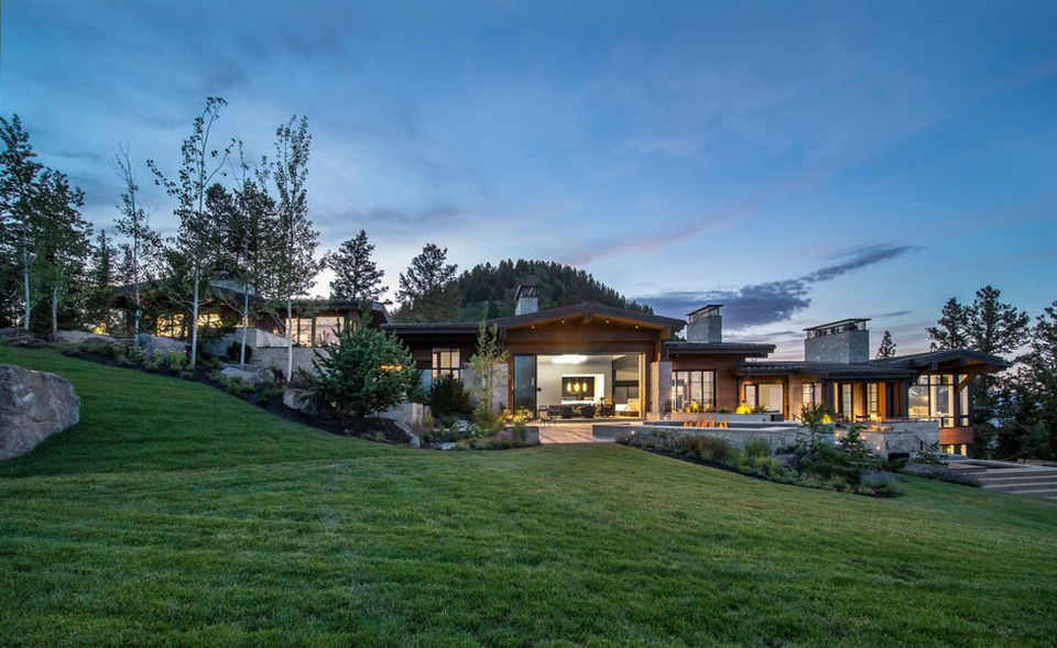 Luxury mountain home at dusk