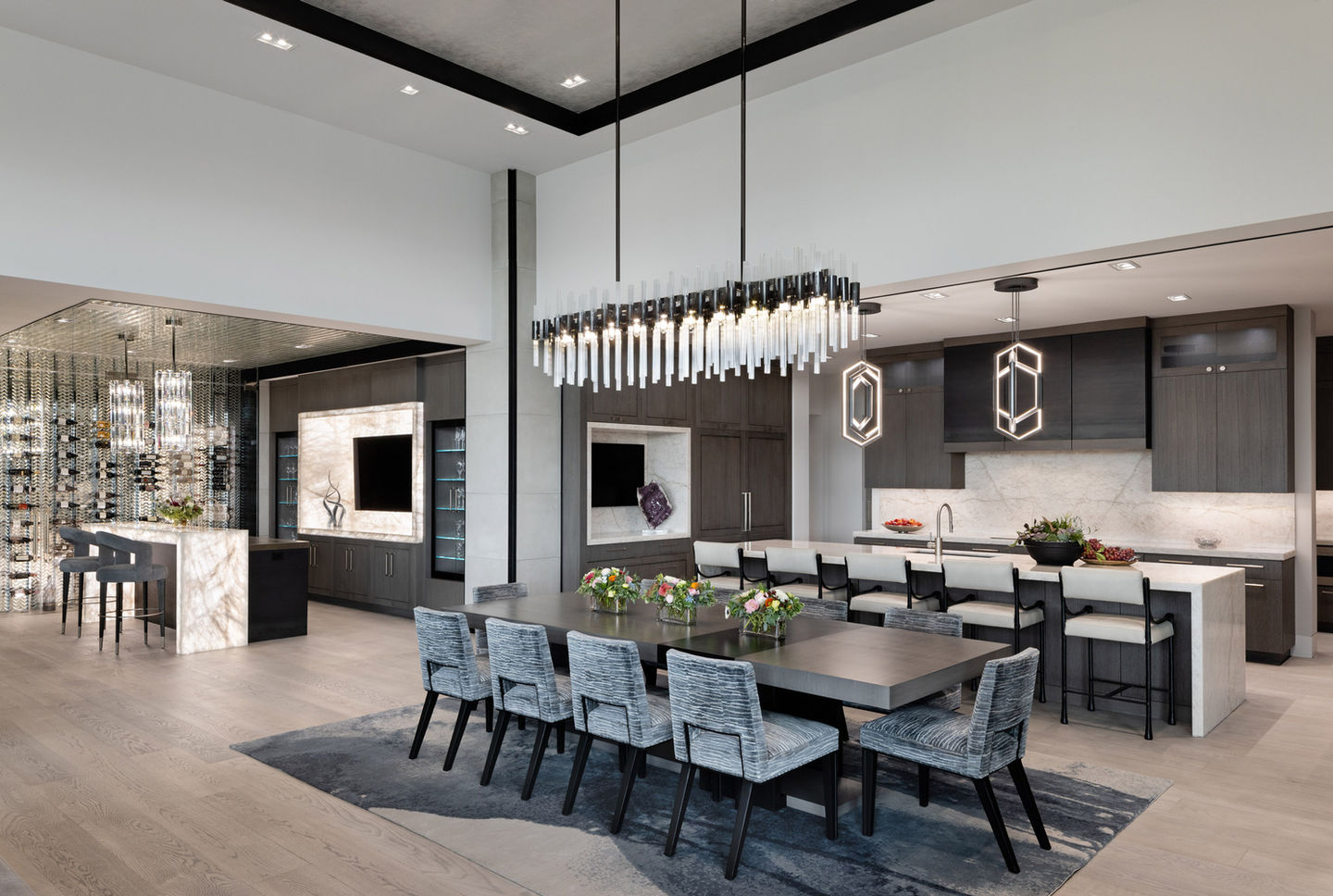 Modern dining room with large table and chandelier