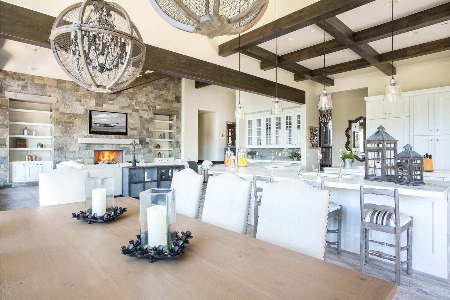 Elegant kitchen and living area with rustic beams
