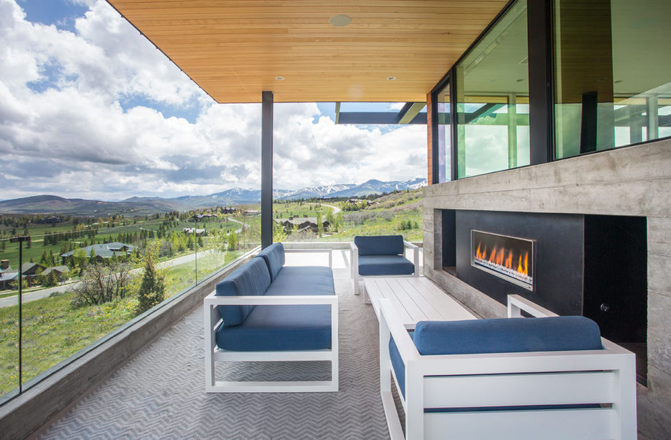 Modern outdoor patio with mountain view