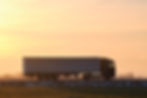 semi-truck-with-cargo-trailer-driving-on-highway-h-2024-12-07-02-02-35-utc.jpg