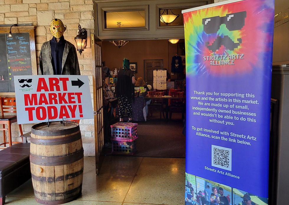 Over fifteen artists will be setup inside the taproom and this is the main entrance to the first part of the show. Note: this picture was from our first event which had a horror vibe so that explains the haunting figure on the left. Photo by Streetz