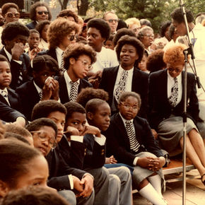 Making of a Monument Dedication at MLK Jr. Park. Children in the audience watching performance