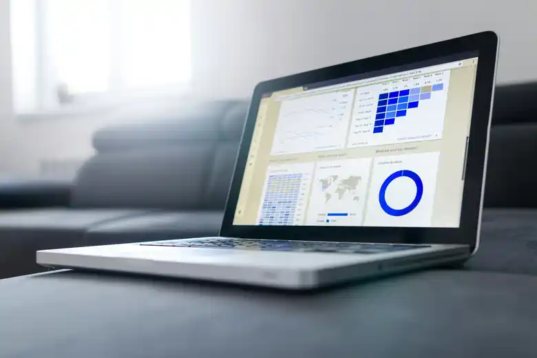 A laptop showing analytics charts