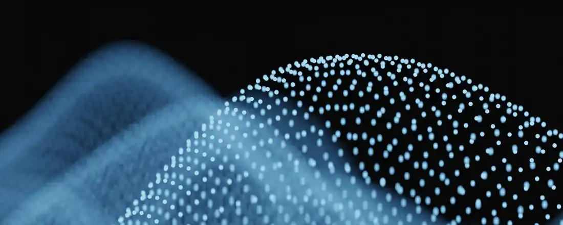 Points of light forming a wave, suggesting data