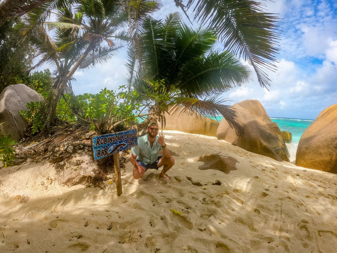 Robinson Crusoe bar sign at Anse Source D'Argent
