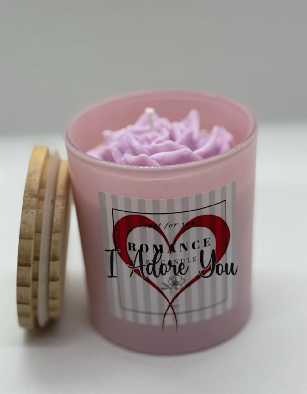 a candle in a clear jar