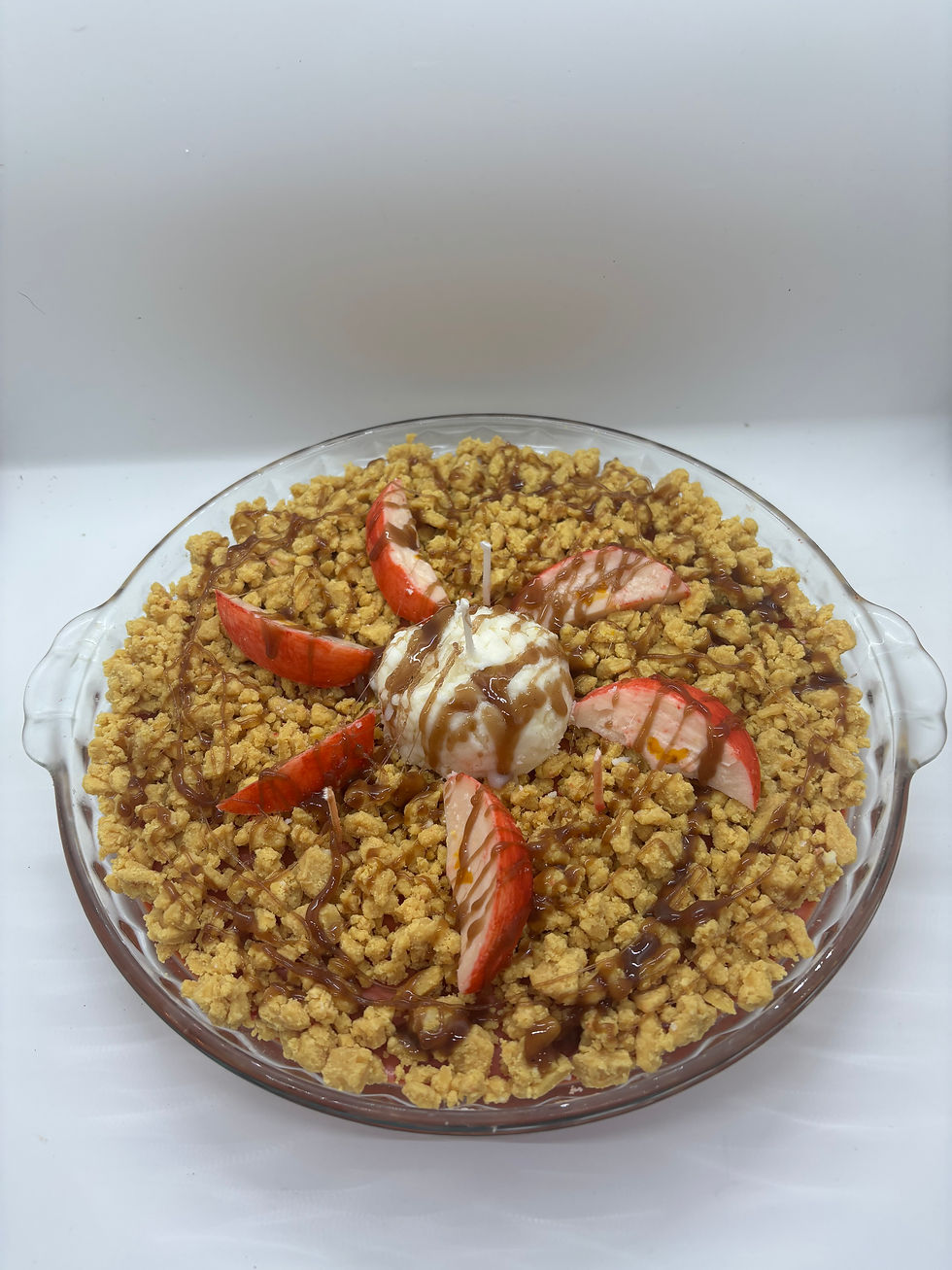 a candle made to look like a apple crumb pie