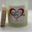 Thumbnail: a candle in a clear jar