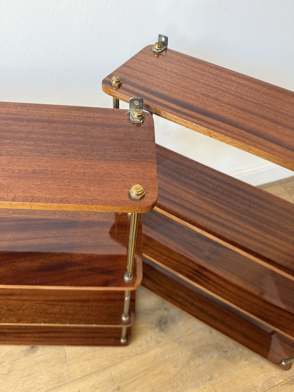 Thumbnail: Pair of lacquered wood and brass shelves