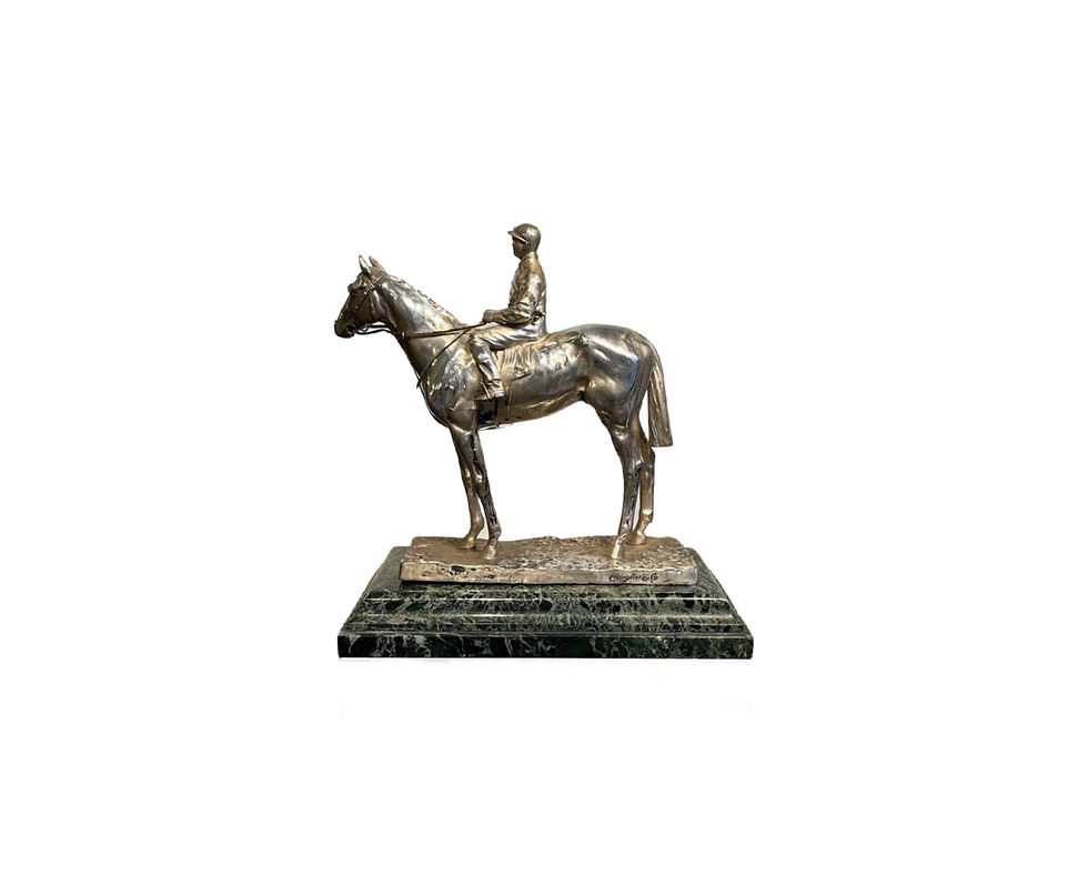 Silverplated sculpture of jockey on horseback