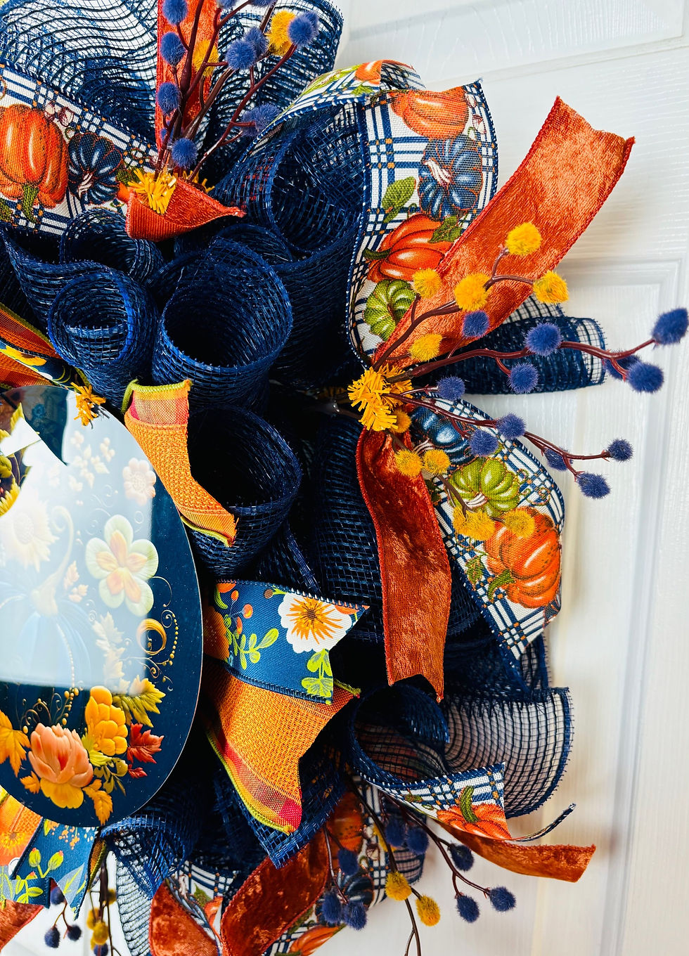 Thumbnail: Brilliant navy blue and coppery orange fall pumpkin autumn wreath