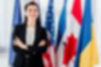 stock-photo-happy-diplomat-standing-crossed-arms (2)_edited
