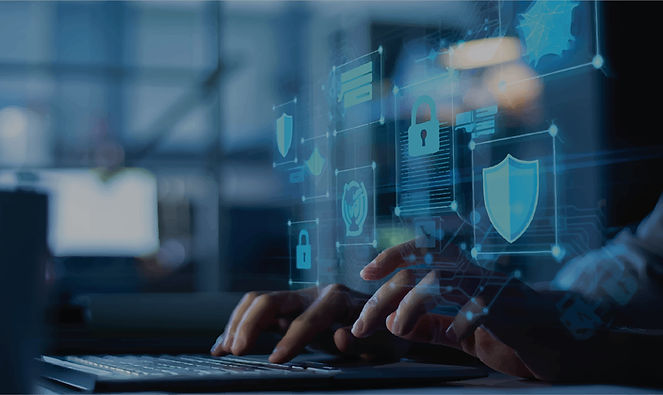Hands typing on laptop with managed cybersecurity services icons.