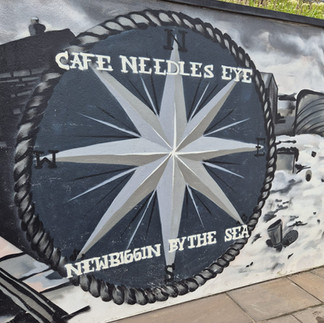 Girls weekend wellness experience at Café Needles Eye on the Northumberland seafront, sauna sessions and cold-water sea dips with coastal views.