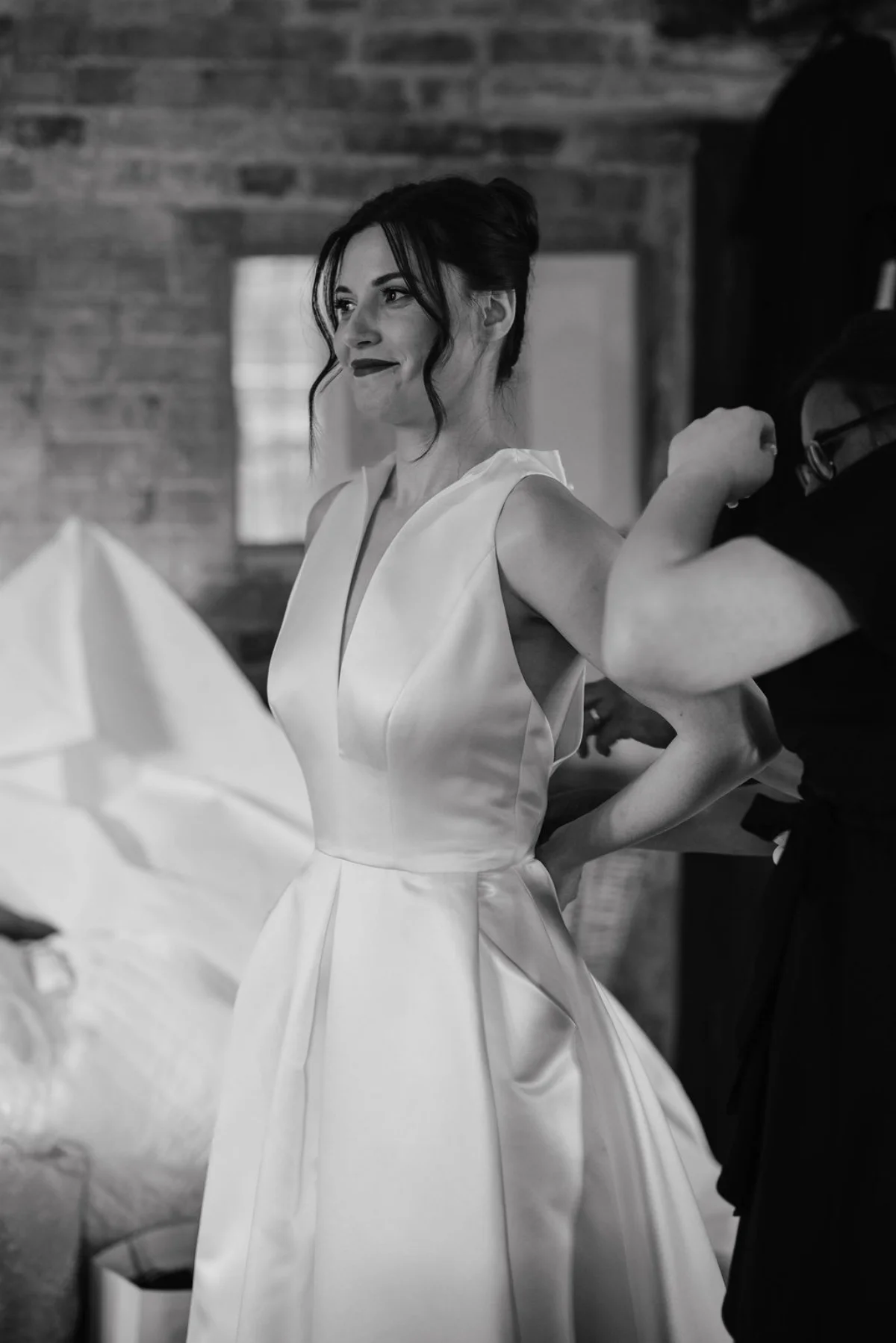 A bride gets ready at Childerley Estates in Cambridge. Black and white wedding photography by Mikaela Jade.