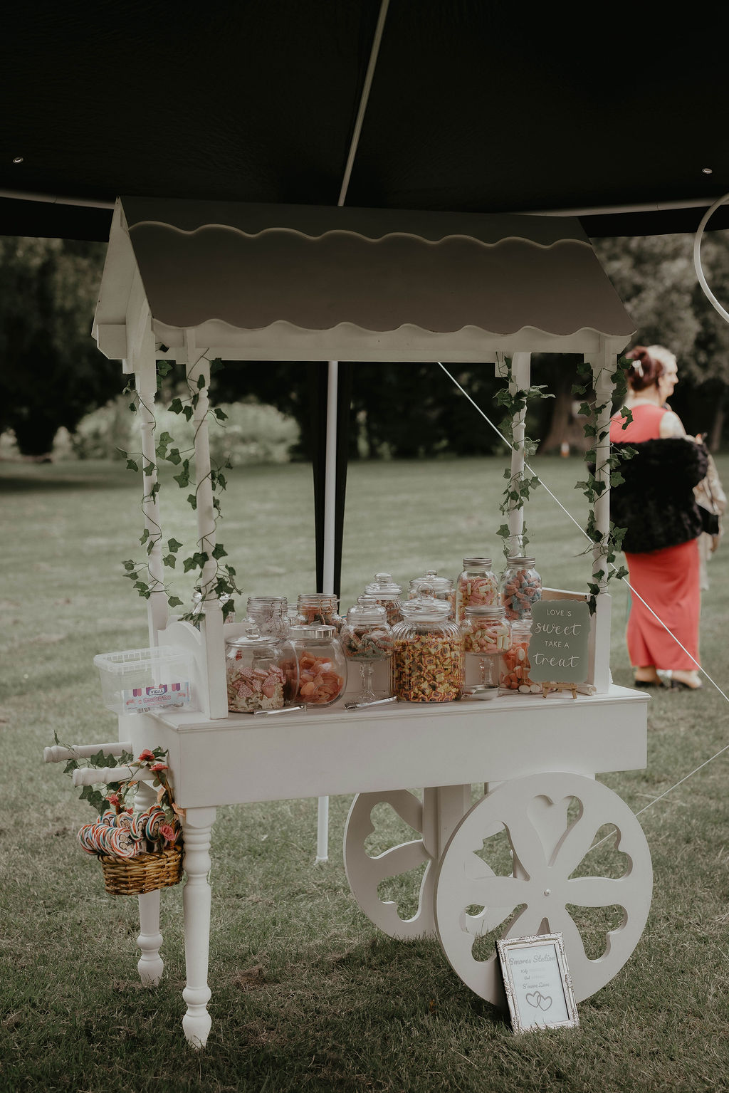 A retro sweet cart at a wedding. By Suffolk wedding photographer Mikaela Jade.