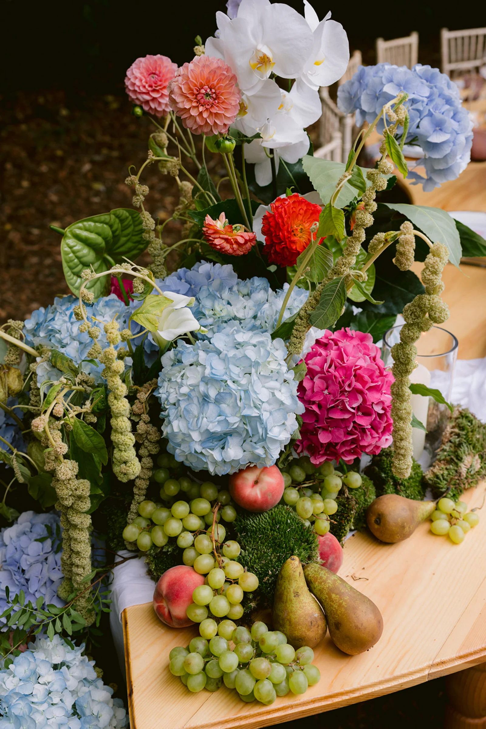 A close-up of colourful floral arrangements on a table.