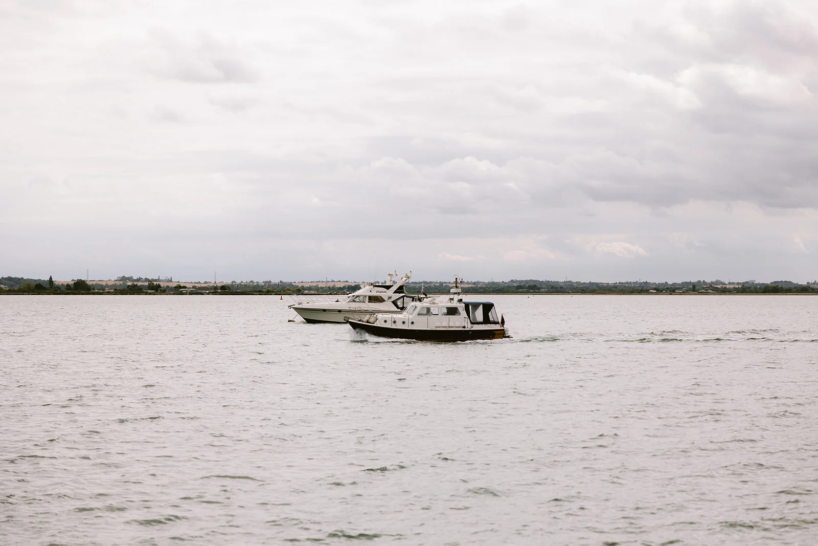 Boats arriving at Osea Island, Essex