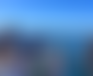 Students and loved ones looking at the ocean on a boat