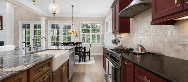 Burgundy kitchen with stained island