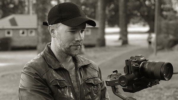 Mike Hearle holding camera on a steadicam gimbal