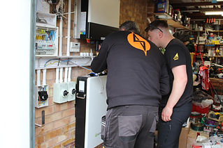 Electrician installing an EV charging point