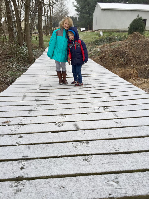 Farm kids smiling in the snow