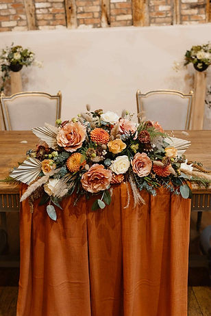 orange-flower-wedding-arrangement.jpg