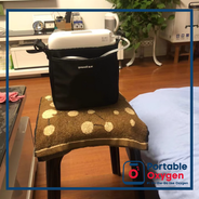 Woman receiving portable oxygen rental delivery at apartmentWoman receiving portable oxygen rental delivery at apartment