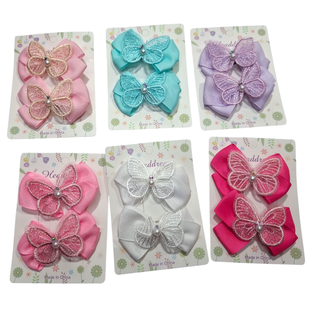 Set de moños con mariposa hebillas el blister 