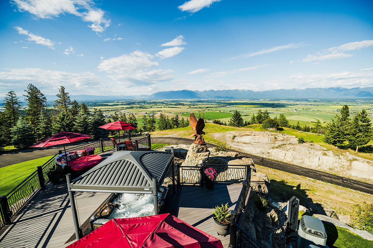 The hot tub pavilion and decks above the valley