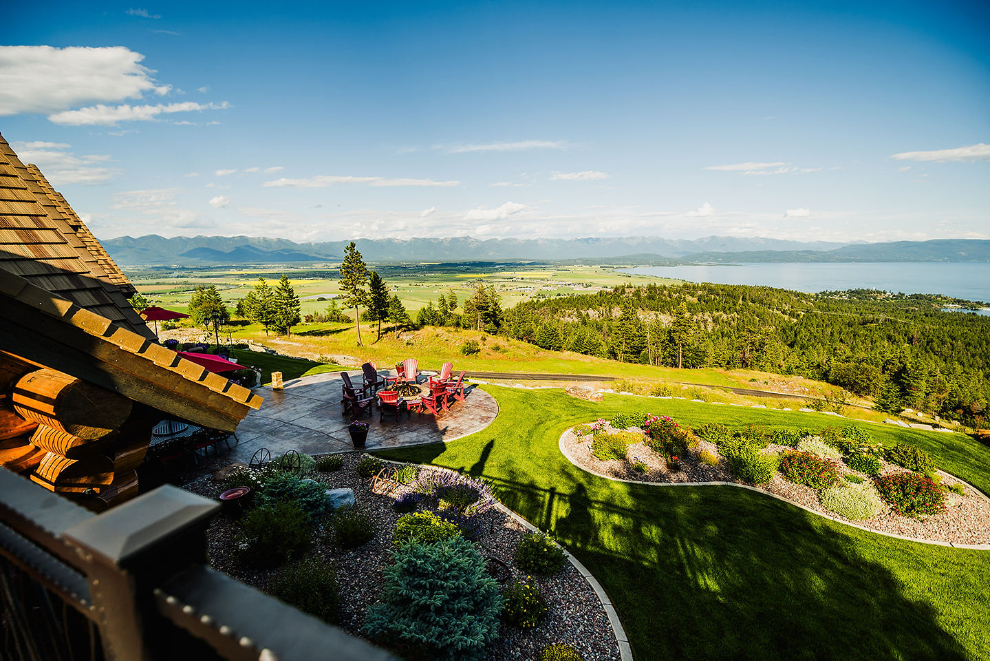 Looking down over the lawns and gardens to Flathead Lake