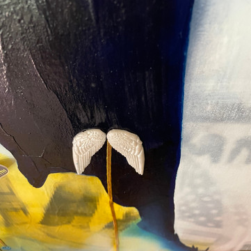 Detail 11: Here we have a clear view of the pair of angel wings representing Amanda Gorman's home, Los Angeles, the City of Angels. It is my home town, and it represent the loss of my father who died days earlier due to COVID-19 complications.