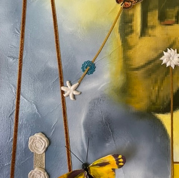 Detail 1: Two polymer butterflies, four polymer flowers, and one polymer mandala. String, nylon rope, and velvet ribbons.