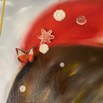Detail 3: Six polymer flowers set in resin, one polymer mandala set in resin, and one polymer butterfly on gold ribbon.