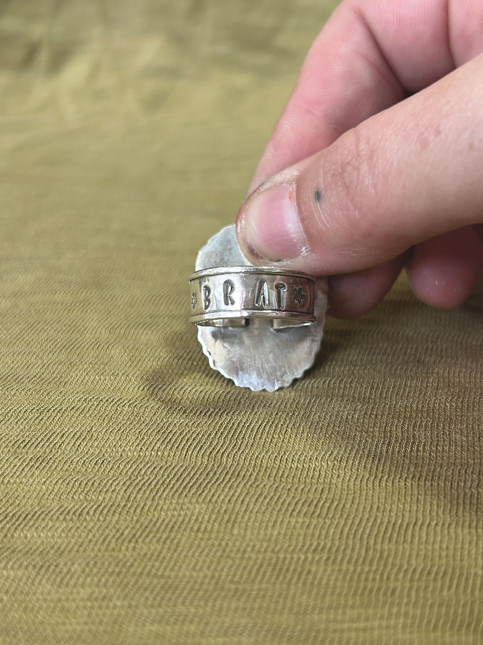 Thumbnail: "brat" Ring